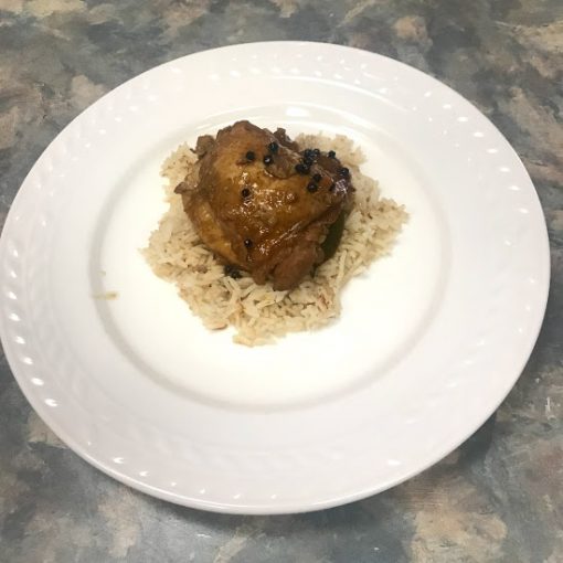 Chicken adobo over rice