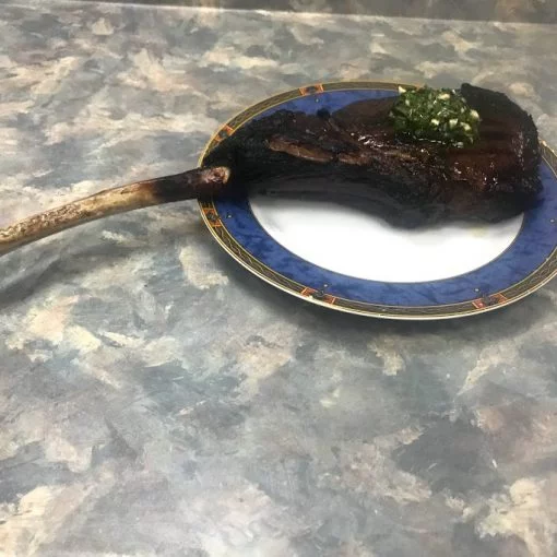 rib steak with chimichurri sauce