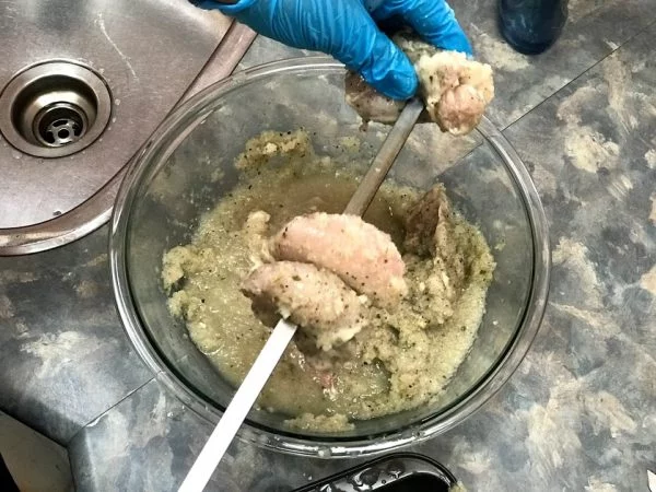 Chicken shashlik being skewered