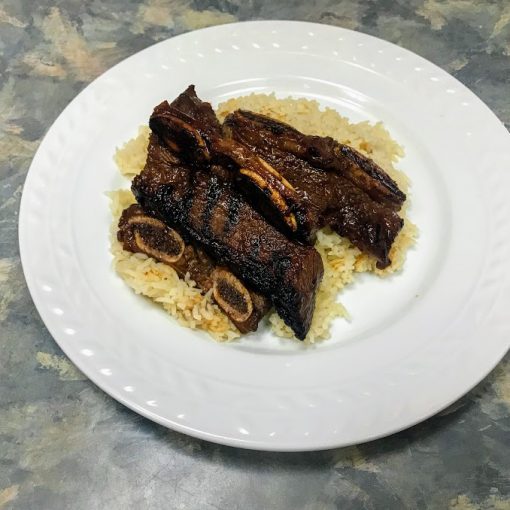 Serving spicy Korean BBQ short ribs