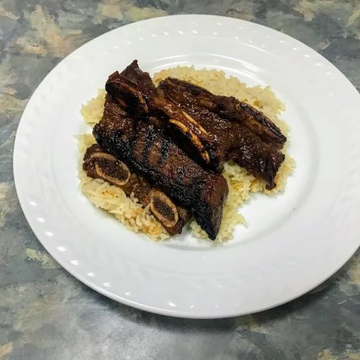 Serving spicy Korean BBQ short ribs