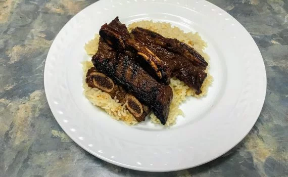 Serving spicy Korean BBQ short ribs