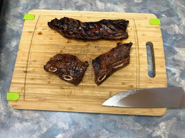 Slicing spicy Korean BBQ short ribs