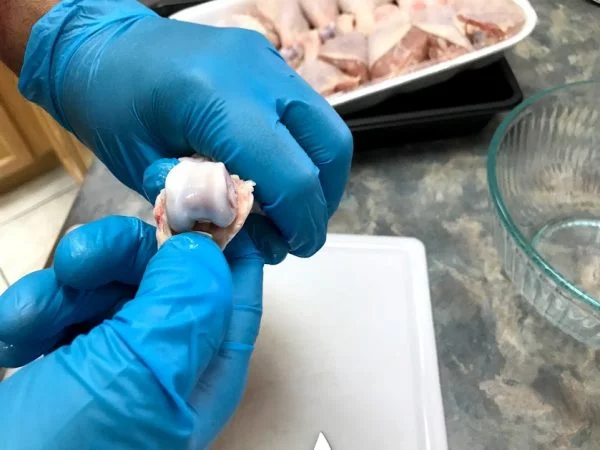 Removing knuckle for chicken lollipop
