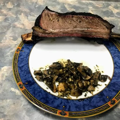 Sauteed mushrooms with smoked beef rib
