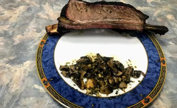Sauteed mushrooms with smoked beef rib