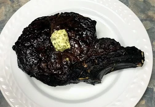garlic parsley compound butter on steak