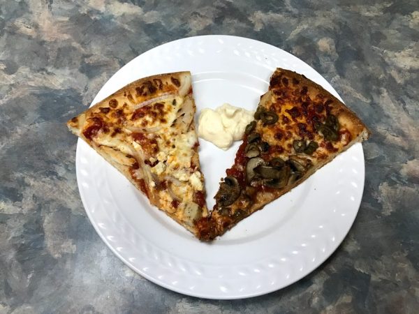 Pizza with creamy garlic dipping sauce